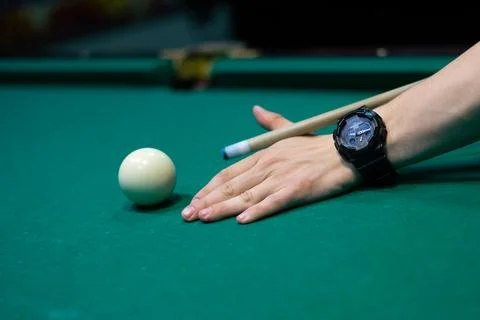 Billiard balls on green table in pool club copy space Stock Photos