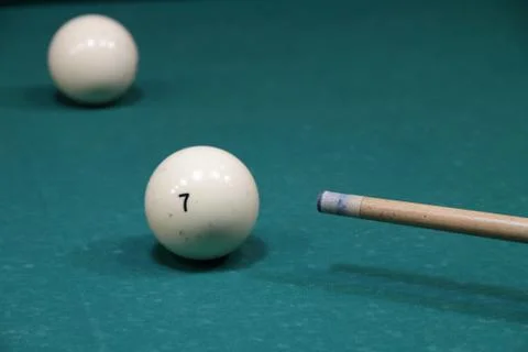 Billiard balls in a pool table in the closeup Stock Photos