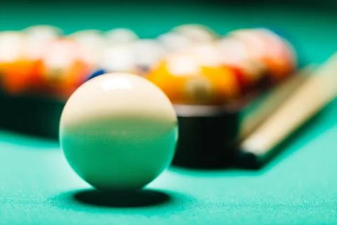 Billiard balls in a pool table. Stock Photos