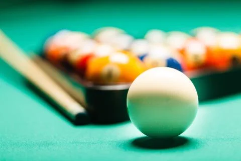 Billiard balls in a pool table. Stock Photos