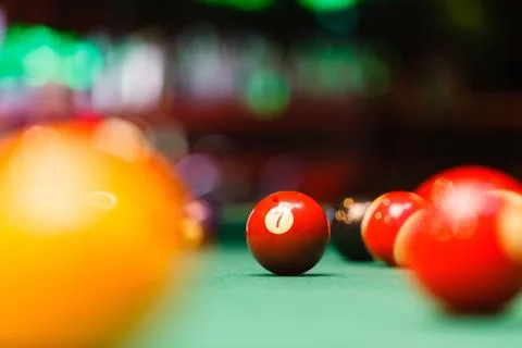 Billiard balls in a pool table. Stock Photos
