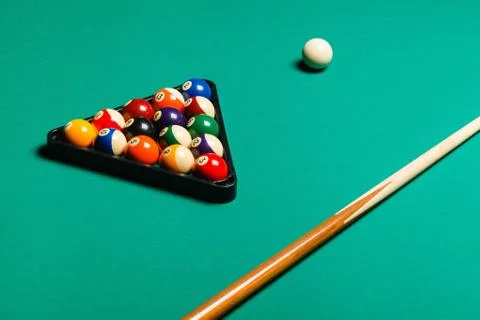 Billiard balls in a pool table. Stock Photos