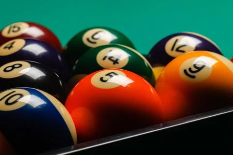 Billiard balls in a pool table. Stock Photos