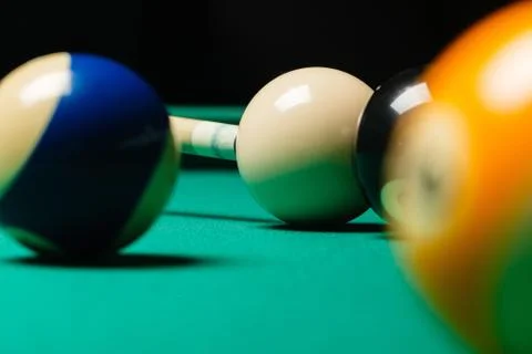 Billiard balls in a pool table. Stock Photos