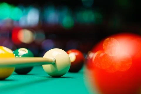 Billiard balls in a pool table. Stock Photos