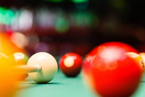 Billiard balls in a pool table. Stock Photos