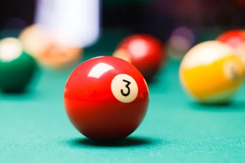 Billiard balls in a pool table. Stock Photos