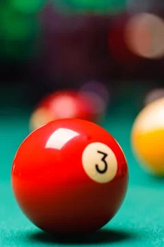 Billiard balls in a pool table. Stock Photos