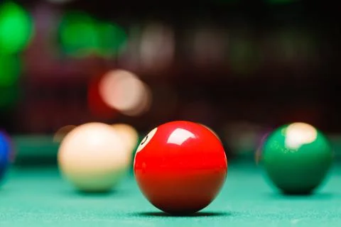 Billiard balls in a pool table. Stock Photos