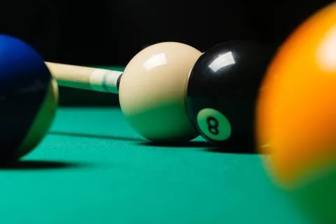 Billiard balls in a pool table. Stock Photos
