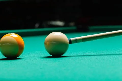 Billiard balls in a pool table. Stock Photos