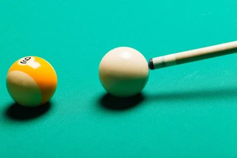 Billiard balls in a pool table. Stock Photos