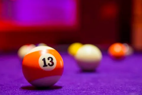 Billiard balls in a pool table Stock Photos