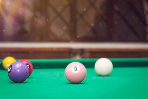 Billiard Balls in a pool table. Stock Photos