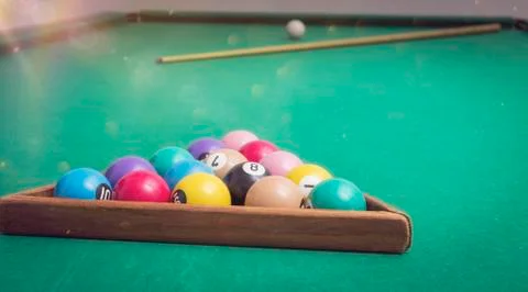 Billiard Balls in a pool table. Stock Photos