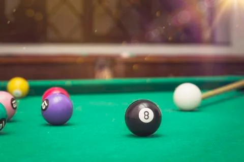 Billiard Balls in a pool table. Stock Photos