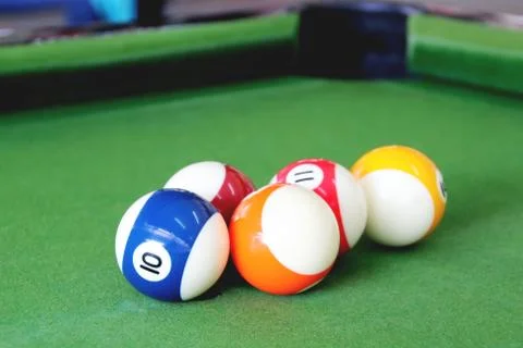 Billiard balls on a pool table Stock Photos