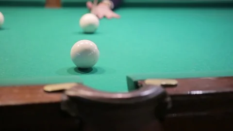 Billiard balls roll into the pocket Video stock 81001387