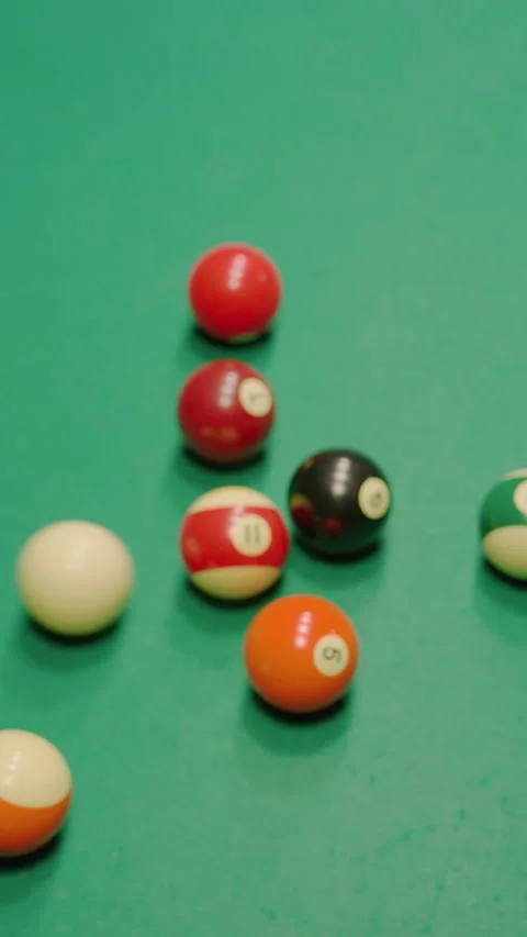 Billiard Balls Scatter on Green Pool Table After Powerful Break Shot Stock Footage 319794120