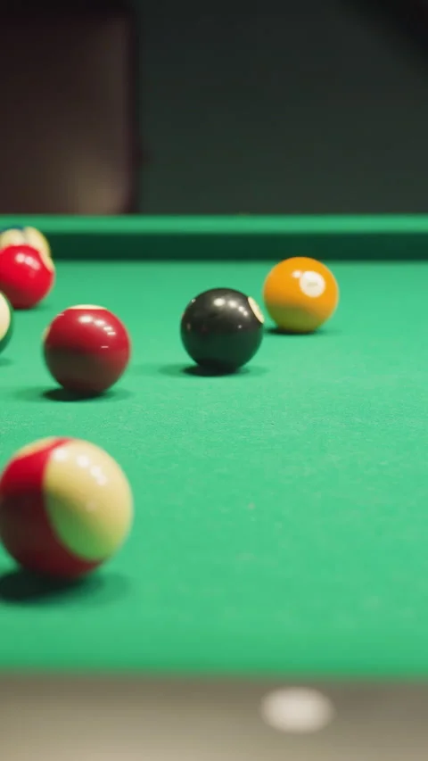 Billiard Balls Scattered on Green Pool Table After Break Shot in Motion Stock Footage 319789987