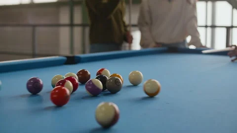 Billiard Balls Scattering across Pool Table after Break Shot Stock Footage 332773356