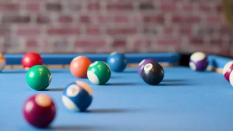 Billiard Balls Scattering on Blue Pool Table After Break Shot Stock Footage 318502096