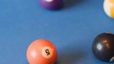 Billiard Balls Scattering on Blue Pool Table After Break Shot Stock Footage 319981591