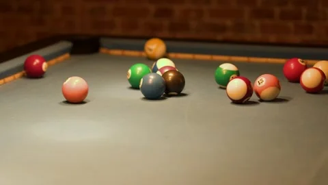 Billiard Balls Scattering on Pool Table After Break Shot Stock Footage 321720685