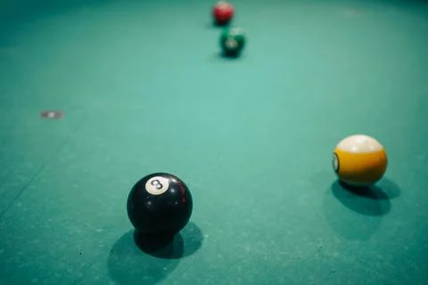 Billiard balls on the table, eight in focus Stock Photos