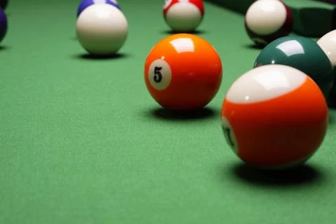 Billiard on green table Stock Photos