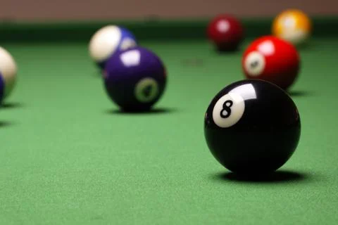 Billiard on green table Stock Photos