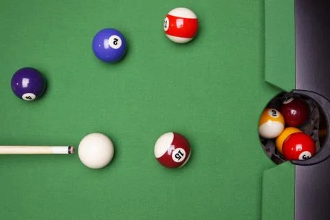 Billiard on green table Stock Photos