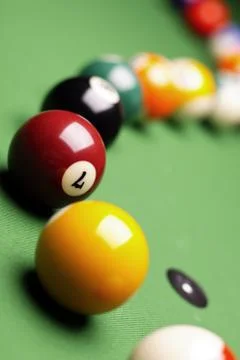 Billiard on green table Stock Photos