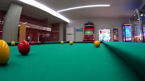 Billiard Player preparing to shoot,hitting the cue ball and she hit yellow ball Stock-Footage 64315138
