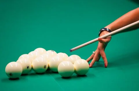 Billiard Player Preparing a Shot with White Pool Balls Fotos de archivo