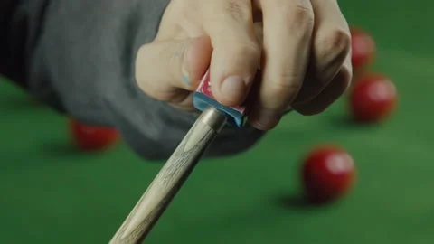 Billiard Player Rubbing The Snooker Cue With Chalk Stock Footage 147874797