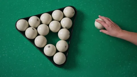 The billiard player's hands align the pyramid of balls. Billiard balls. A table 스톡 동영상 255513945