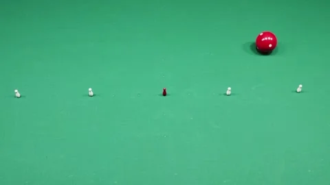 Billiard: Red ball gets hit and slaloms through the skittles put in a row 스톡 동영상 277183011