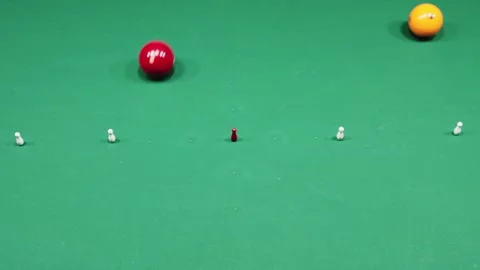Billiard: Red ball gets hit and slaloms through the skittles in a row 스톡 동영상 277183799