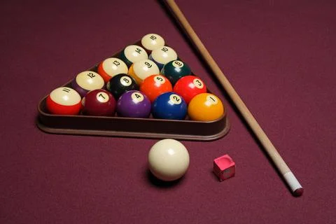Billiard table with game accessories Stock Photos