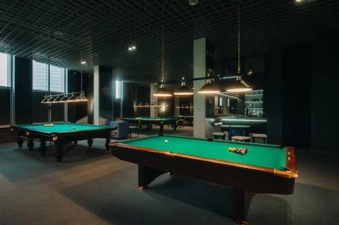 Billiard table with green surface and balls in the billiard club.Pool Game 스톡 사진
