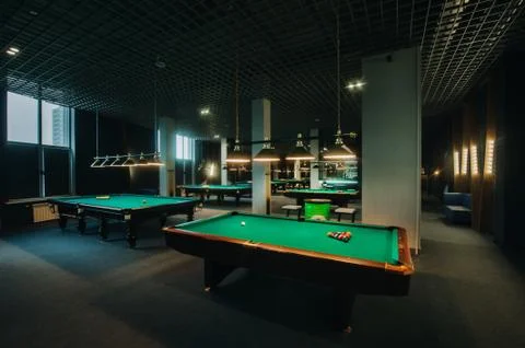 Billiard table with green surface and balls in the billiard club.Pool Game Stockfoto's
