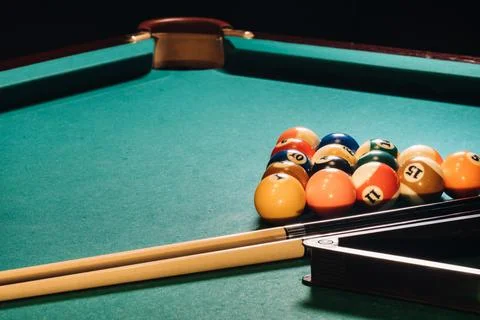 Billiard table with green surface and balls in the billiard club.Pool Game Stock Photos
