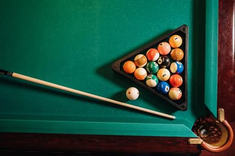 Billiard table with green surface and balls in the billiard club.Pool Game Stock Photos