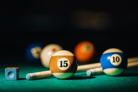 Billiard table with green surface and balls in the billiard club.Pool Game Foto stock