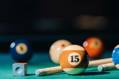 Billiard table with green surface and balls in the billiard club.Pool Game Stock Photos