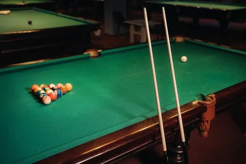 Billiard table with green surface and balls in the billiard club.Pool Game 스톡 사진