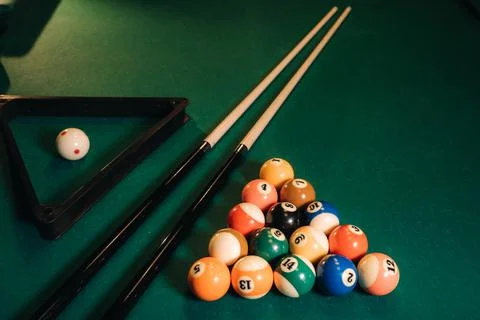 Billiard table with green surface and balls in the billiard club.Pool Game 스톡 사진