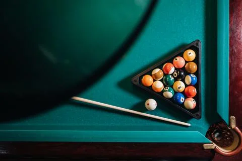 Billiard table with green surface and balls in the billiard club.Pool Game Stock Photos