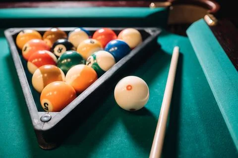 Billiard table with green surface and balls in the billiard club.Pool Game Foto stock